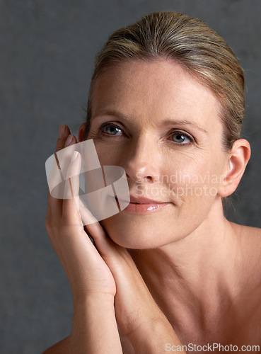 Image of Face, beauty and memory with mature woman in studio on gray background for aesthetic wellness. Skincare, thinking and relax with natural skin person at spa for antiaging cosmetics or treatment