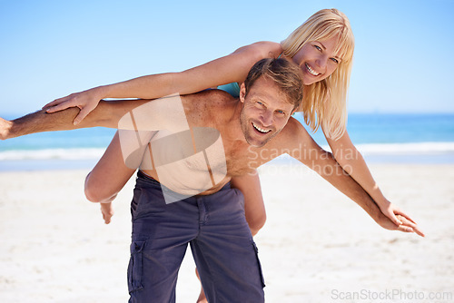 Image of Portrait, piggyback and couple at a beach with airplane, support and bonding in nature together. Travel, face and happy people at sea with love for adventure, romance or summer fun journey in Jakarta