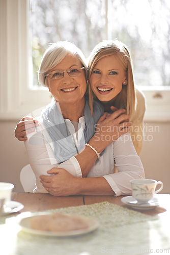 Image of House, hug and girl visit mom for breakfast, coffee and daughter with senior, retirement and embrace. Female person, smile and happiness with mother in family home, elderly and woman in dining room