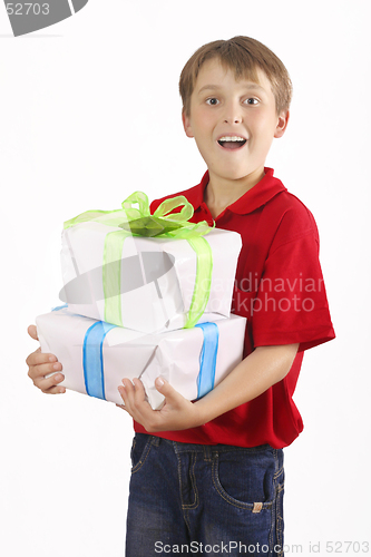 Image of Boy carrying gifts