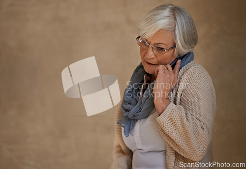 Image of Senior woman, phone call and communication on tech, talking and app for conversation in home. Elderly female person, contact and connection or voip for chat, networking and mockup space in Egypt