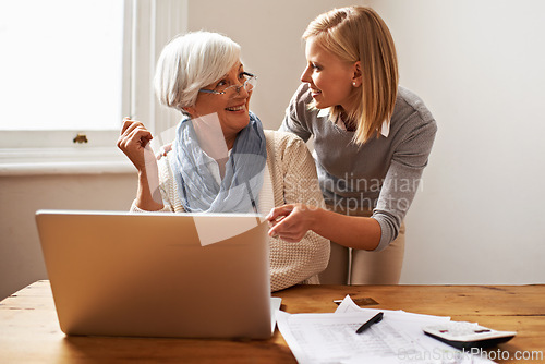Image of Granddaughter, grandmother and helping with laptop for online payment, finance and technology with advice on budget. Women pay bills, life insurance or tax paperwork with retirement and assistance