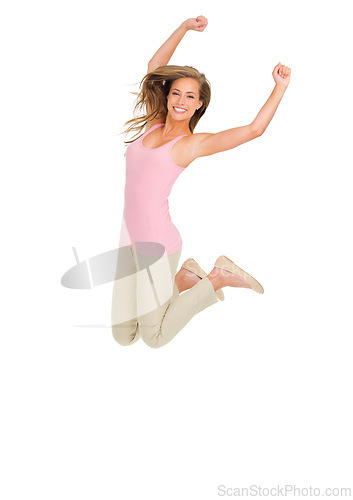 Image of Jump, celebration and portrait of happy woman in studio excited for competition, prize or results on white background. Energy, success and female model with wow news, winning or giveaway promotion