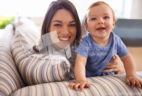 Image of Mother, baby and portrait for care in hug, couch and support or relax in living room and comfortable. Mommy, son and affection for bonding in childhood, security and happiness in embrace or smile