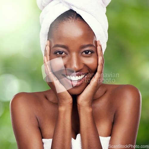 Image of Hair towel, black woman portrait in studio for skincare, wellness or dermatology results on green background. Beauty, cleaning and face of African lady model with cosmetic, pamper or spa aesthetic