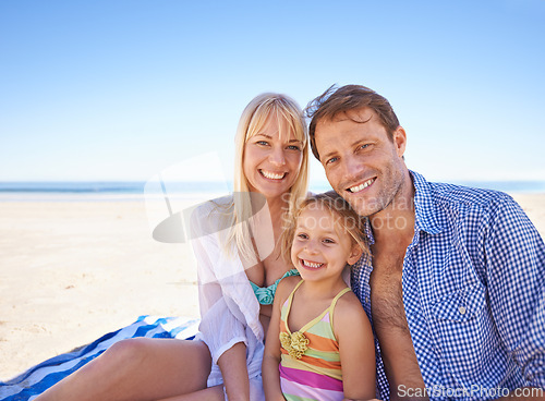 Image of Portrait, family at the beach and parents with child outdoor, holiday in Sydney for summer and happy together. Man, woman and young girl with hug, adventure and travel, trust and support with bonding