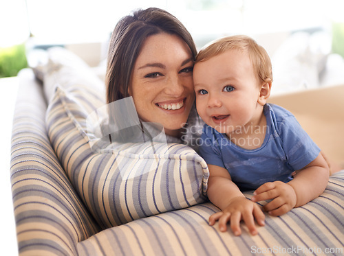 Image of Mother, baby and portrait for love in embrace, care and support or relax in living room and comfortable. Mommy, son and affection for bonding in childhood, security and hug on couch or smile on face