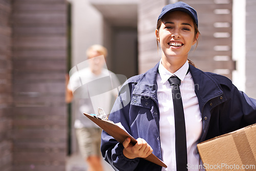 Image of Delivery woman, box and clipboard in portrait at house for customer with smile for shipping in neighborhood. Girl, courier and employee in supply chain, logistics and checklist for cardboard package