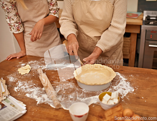 Image of Hands, senior and baking cake in kitchen for bakery with flour, eggs and dessert for Easter weekend. Chef, woman and grandma teaching girl on table with ingredients for cookies, snacks and food