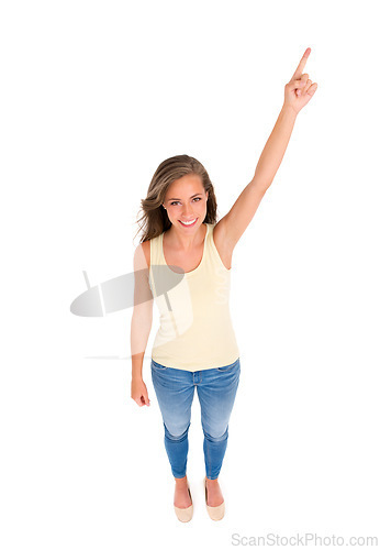 Image of Woman, portrait and pointing for marketing, sale or discount in studio with isolated white background. Smile, top view and hand gesture of female model for advertising, promotion or announcement.