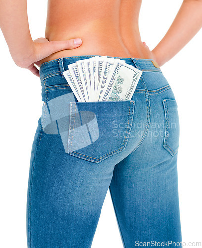 Image of Money, jeans and fashion for rich female, luxury and expensive clothing on white background. Dollars, cash and back pocket with fit buttocks of woman model, pay and quality designer in studio