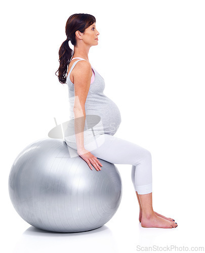 Image of Pregnant female person, ball and white background for final trimester, wellness and exercise for motherhood. Maternal woman, workout and studio for health, fitness and pregnancy to keep in shape