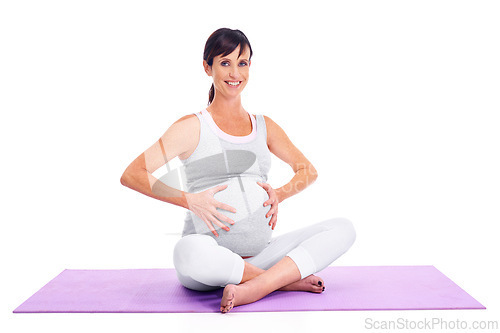 Image of Portrait, pregnant and yoga with woman on exercise mat in studio isolated on white background. Fitness, pilates and smile with happy young person training for prenatal health or pregnancy wellness