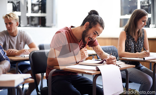 Image of Man, class and writing notes in college, learning and knowledge on campus for education. Students, people and reading for information in book, planning and research for studying or revision for exams