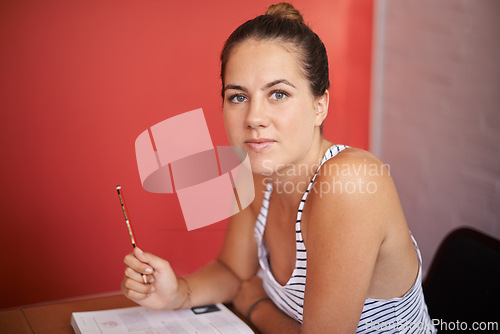 Image of College student, portrait and desk in classroom with textbook for english literature or language for exam. Female person, university and scholarship for learning or education, knowledge and studying.
