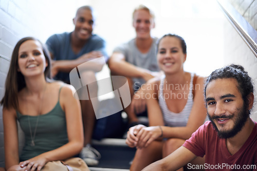 Image of Bonding, stairs and group of students in portrait, smile and relaxing with education and friends. Men, women and people with diversity and scholarship for university and college, learning and course