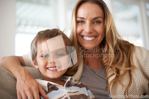 Image of Smile, portrait and mother with son to relax, love and bonding together on couch for holiday wellness. Happy family, care and face of woman with child and healthy for childhood development in home