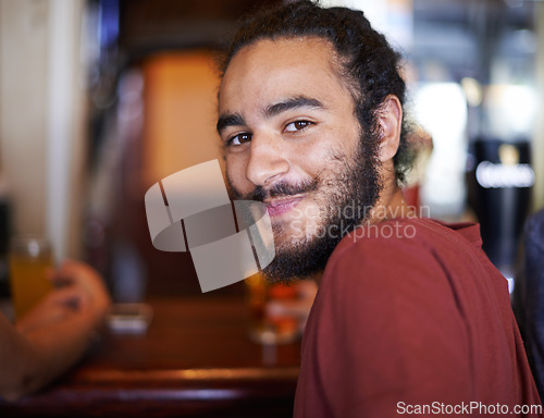 Image of Student man, smile and pub with beer, party and group fun with alcohol. Social, happy hour and campus restaurant for Turkish learner, celebration and weekend relax after exams or university project