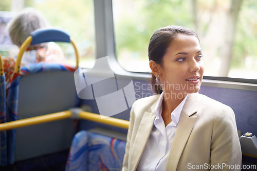 Image of Transport, travel and commute for business woman sitting on bus for journey and trip to work. Young person, passenger or patron with smile and thinking in suit on vehicle for workplace or office