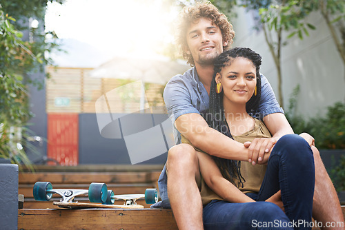 Image of Diverse couple, outdoor and smile for skateboard, park and date together in summer for boyfriend and girlfriend. Multiracial, male and female for nature, happy and love for outside of city life