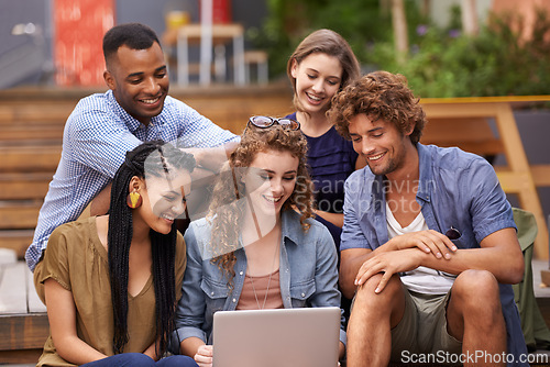 Image of Students, college and smile with laptop, friends and outdoor for browsing social media and happy mates. Research, scrolling and people for learning, ebook and online at scholarship with casual fit