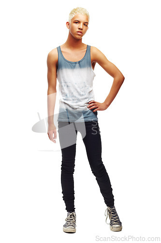 Image of Portrait, teen boy and confident in studio for fashion, trendy, edgy and style with pride. Teenager, model and stylish outfit on white background for casual, clothes and cool with attitude or glare