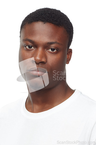 Image of Portrait, studio and black man with tshirt, serious and closeup on face for clothes. African male person, confident and style for aesthetic of fashion, casual and cool as model in white background