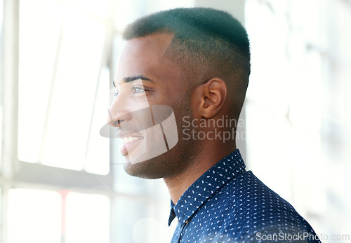 Image of Businessman, thinking and smiling through window with vision for future dream, startup and company. Black male person, ideas and standing at building opening with thoughts for growth, career and work