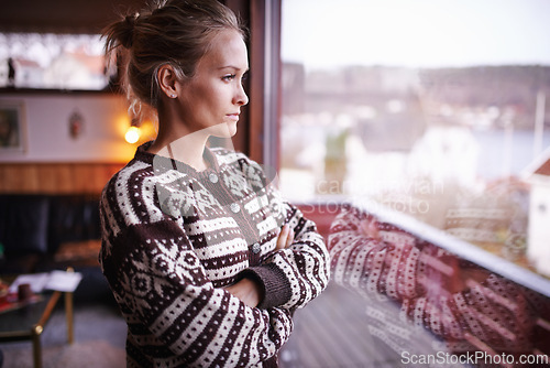 Image of Confident, woman or window with vision for thinking, planning or ideas for future in Stockholm. Thoughtful, female person and arms crossed for contemplation of questions, solutions and problems