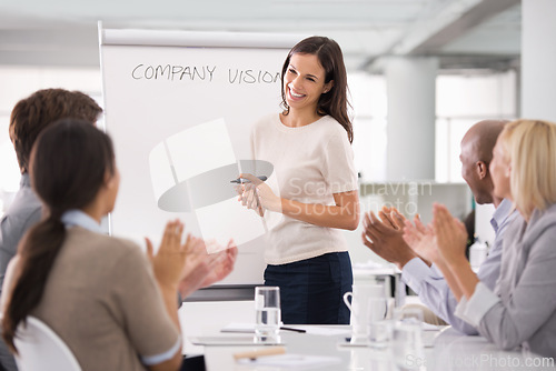 Image of Woman leadership, clapping and presenting for company vision, planning and discussion in office. Female boss, boardroom and colleagues in management meeting, applauding or celebrating new ideas