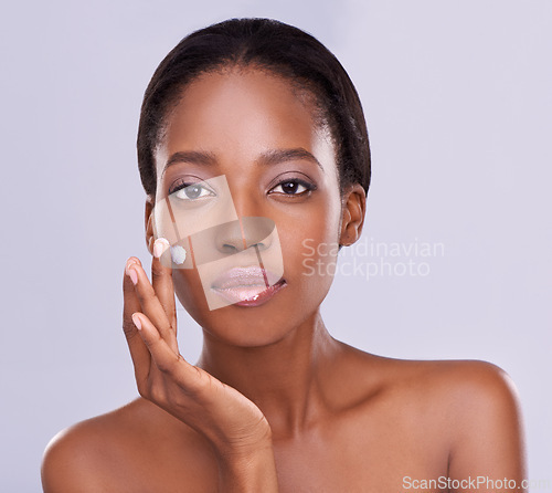 Image of Portrait, cream and black woman for beauty and dermatology, cosmetic product and shine on white background. Skincare, lotion or sunscreen for moisturizer, antiaging with skin and facial in studio