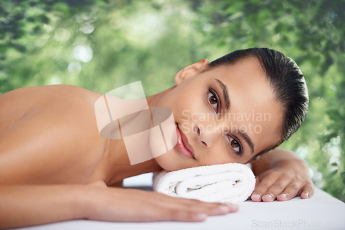 Image of Outdoor, massage and portrait of woman at spa to relax, beauty or luxury pamper for wellness. Nature, face or person in treatment at salon for skincare therapy, peace or calm for body health at table