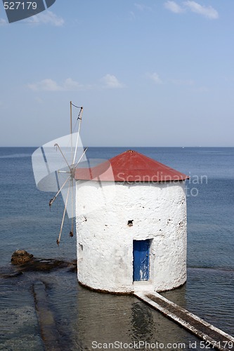 Image of white mill and blue