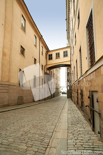 Image of Village, road and buildings with vintage for architecture, heritage and culture for tourism in Italy. Ancient, traditional and street for travel in historic community or neighborhood for tourist.