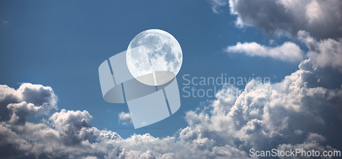 Image of Moon, cloud and blue sky with light for twilight, fog or weather of natural scenery in nature. Moonlight, sphere or full circle with cloudy fog, lunar or bright orb of glowing hemisphere in the air