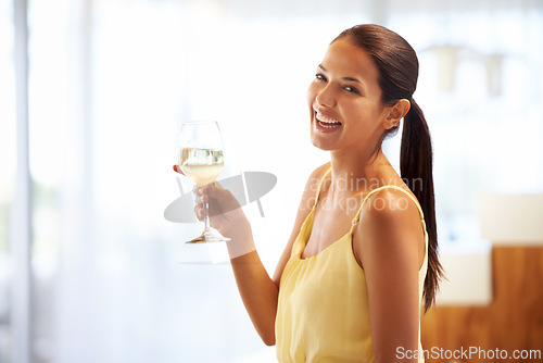 Image of Smile, portrait and woman with glass of wine at home for celebration, toast or success at home. Happy, achievement and portrait of female person drinking champagne or alcohol in modern apartment.