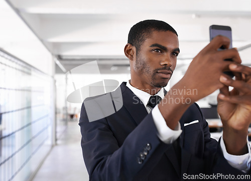 Image of Businessman, serious and selfie in office for memory of job interview, pride and social media post. Man, photography and pose at company with confidence for lawyer, career or startup at work