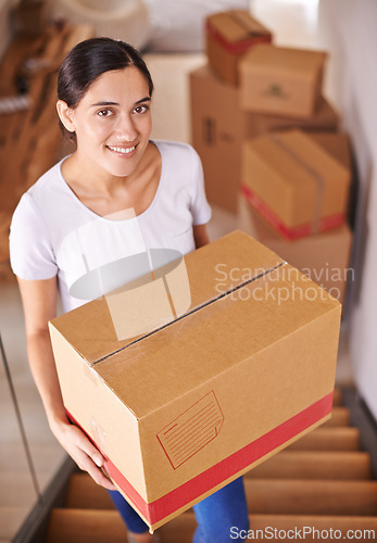 Image of Portrait, smile and woman with boxes for new home, real estate and moving at stairs. Happy person, cardboard and relocation to property at steps in house, apartment and loan for mortgage of owner