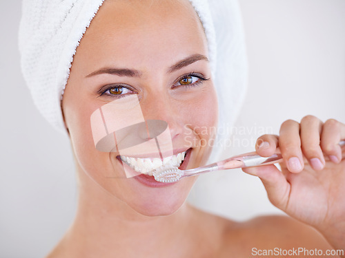 Image of Toothbrush, dental and portrait of woman brushing teeth for health, wellness and morning oral routine. Self care, smile and young female person with mouth for clean, hygiene or dentistry treatment.