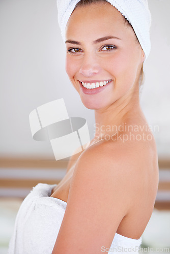 Image of Portrait, spa and skincare of happy woman in bathroom for wellness or beauty at home. Face, towel and natural cosmetics of female person with facial treatment, cleaning or hygiene for healthy body