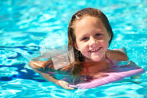 Image of Happy, portrait and child with inflatable in swimming pool, games or learning with support in water park on vacation. Holiday, activity or girl relax at resort with toys to enjoy adventure in summer