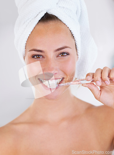 Image of Toothbrush, health and portrait of woman with dental, wellness or oral hygiene routine. Smile, dentistry and young female person with clean, fresh and natural mouth treatment for self care at home.