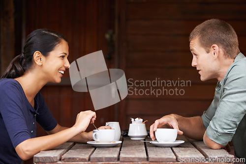 Image of Restaurant, coffee and couple with conversation, date and customers with relationship and weekend break. Cafe, relaxing or man with woman or morning tea with marriage or bonding together with clients