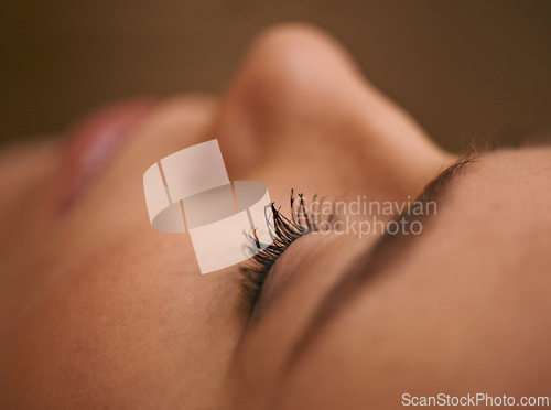 Image of Face, skincare and woman with eyelash for facial, treatment and self care to relax, peace and wellness. Closeup, female person and dermatology with mascara to glow for smooth, natural look and beauty