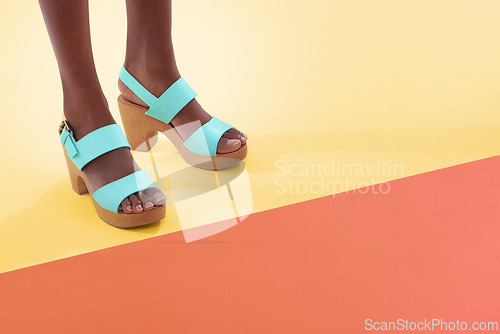 Image of Female model, fashion and high heels for feet, floor and shoes with mock up space and colour block. Contemporary, stylish and trendy for funky black woman person, retro and vintage designer wear