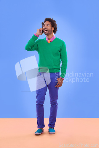 Image of Fashion, black man and phone call in studio for color block in trendy clothes, style and outfit. Male person, stylist and fashionable for season trends with funky, edgy and formal wear in happiness