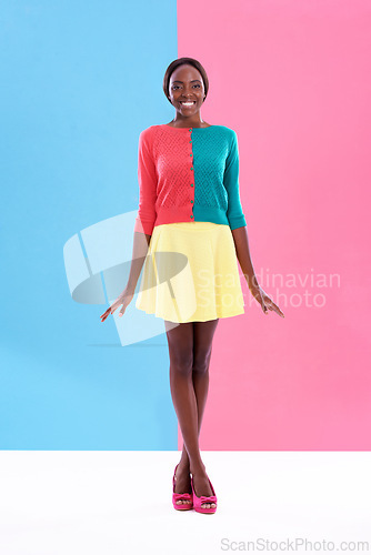 Image of Fashion, studio or portrait of black woman with color block, trendy and stylish outfit with smile. Unique, different or happy African model with edgy, classy or retro style for cool vintage aesthetic