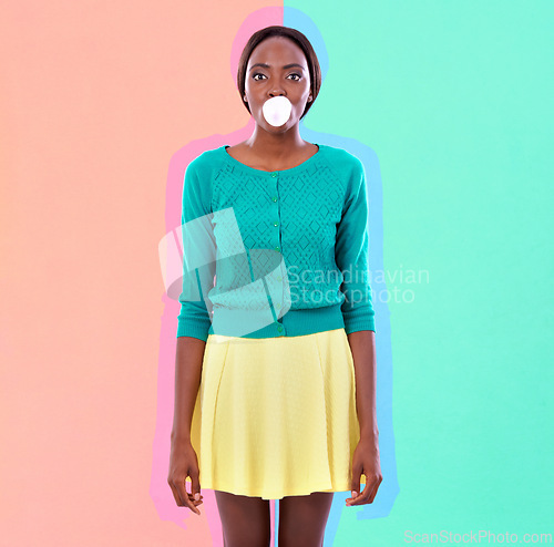 Image of Black woman, studio and fashion with gum for bubble, blowing and stylish with color block. Candy, art and face of African person with outline for fun, chewing and trendy clothes in portrait