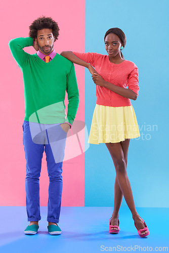 Image of Confused, couple and portrait with fashion in studio, background and creative aesthetic. Doubt, question and woman with support of man and together with colorful retro style and unique clothes mockup