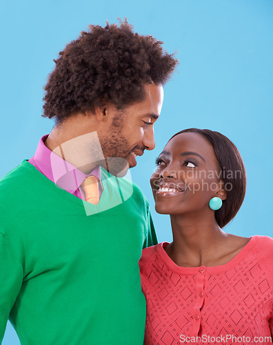 Image of Hug, love and black couple with marriage, romance and bonding together on a blue studio background. Relationship, embrace and man with woman and peace with support and happiness with a date and care